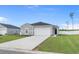 Charming single-story home featuring a well-maintained lawn and a two-car garage, offering a welcoming curb appeal at 181 Saddle St, Conway, SC 29527