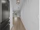 Inviting foyer showcasing stylish light fixtures and an open floor plan with durable flooring throughout the home at 181 Saddle St, Conway, SC 29527