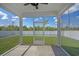 View of the screened in porch overlooking the yard at 181 Saddle St, Conway, SC 29527