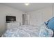 Bedroom featuring a comfortable bed, dresser, and doorway view at 1880 Auburn Ln. # 27 A, Surfside Beach, SC 29575