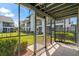 Relaxing screened-in patio with views of green spaces and surrounding residences at 1880 Auburn Ln. # 27 A, Surfside Beach, SC 29575