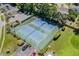 Overhead shot of community tennis courts, showing the well-maintained blue courts and surrounding greenery at 1880 Auburn Ln. # 27 A, Surfside Beach, SC 29575
