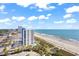 Beautiful aerial view of building next to the beach with ocean view at 2001 S Ocean Blvd. # 1303, Myrtle Beach, SC 29577