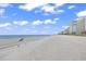 Expansive sandy beach with blue ocean views, perfect for leisurely strolls and relaxation at 2001 S Ocean Blvd. # 1303, Myrtle Beach, SC 29577