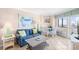 Inviting living area with coastal decor, comfortable sofa, and a view outside at 2001 S Ocean Blvd. # 1303, Myrtle Beach, SC 29577