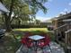 The backyard area boasts an outdoor dining area and a lush lawn, perfect for relaxation and recreation at 2005 Loblolly St., Georgetown, SC 29440
