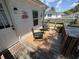 This home has a cozy deck, ideal for relaxing and enjoying the outdoors, with a comfortable seating area at 2005 Loblolly St., Georgetown, SC 29440