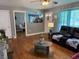 Inviting living room with hardwood floors, cozy seating, and stylish decor at 2005 Loblolly St., Georgetown, SC 29440