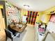 A small kitchen with appliances, dining table, and laundry hook ups at 202 28Th Ave. N # 5, North Myrtle Beach, SC 29582