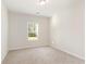 Bright bedroom features plush carpeting, a window, and a neutral color palette at 204 Palmetto Sand Loop, Conway, SC 29527