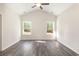 Spacious bedroom with vaulted ceiling, ceiling fan, and large windows at 204 Palmetto Sand Loop, Conway, SC 29527