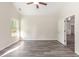 Clean bedroom with a large window and attractive gray wood-look floors at 204 Palmetto Sand Loop, Conway, SC 29527