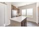 Beautiful kitchen with stainless steel refrigerator and spacious center island at 204 Palmetto Sand Loop, Conway, SC 29527