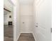 Mud room features hook-ups and overhead shelving with access to other rooms at 204 Palmetto Sand Loop, Conway, SC 29527