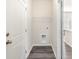 The mud room features hook-ups and overhead shelving for storage and convenience at 204 Palmetto Sand Loop, Conway, SC 29527