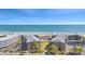 A scenic aerial view showcasing resort-style condo community with a pool, set against the ocean at 208 Ocean Blvd. N # 228, North Myrtle Beach, SC 29582