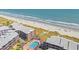 Aerial view of a coastal condo complex with a beachside pool, and direct beach access at 208 Ocean Blvd. N # 228, North Myrtle Beach, SC 29582