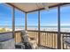 Spacious balcony offers ocean views with cushioned outdoor furniture for relaxing at 208 Ocean Blvd. N # 228, North Myrtle Beach, SC 29582