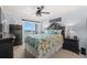 Comfortable main bedroom featuring a ceiling fan and beautiful views of the ocean at 208 Ocean Blvd. N # 228, North Myrtle Beach, SC 29582