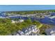 Breathtaking aerial view of the community showcasing waterfront access and scenic bridges at 220 Gloucester Way, Little River, SC 29566