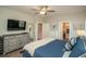 Relaxing bedroom with a large TV and ensuite bathroom access providing a comfortable and private retreat at 220 Gloucester Way, Little River, SC 29566