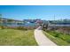 Enjoy waterfront views from this charming dock and walkway, with scenic views of the harbor at 220 Gloucester Way, Little River, SC 29566