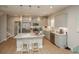 Modern kitchen featuring stainless steel appliances, marble countertops, and an island at 220 Gloucester Way, Little River, SC 29566