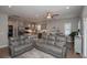 The expansive living space flows seamlessly from the kitchen and dining room at 220 Gloucester Way, Little River, SC 29566