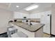 Well-equipped kitchen with granite countertops, modern appliances, and ample cabinet space at 2201 S Ocean Blvd. # 707, Myrtle Beach, SC 29577