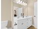 This bathroom has a double sink vanity, a large mirror and plentiful lighting at 2213 Gazebo Ct., North Myrtle Beach, SC 29582