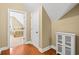 Upstairs bedroom showcasing a closet and a doorway that leads to an adjacent bedroom at 2213 Gazebo Ct., North Myrtle Beach, SC 29582