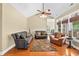Inviting living room featuring hardwood floors, a ceiling fan, and comfortable seating arrangement at 2213 Gazebo Ct., North Myrtle Beach, SC 29582
