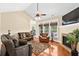 Comfortable living room with plush seating, fireplace, and large windows for natural light and views at 2213 Gazebo Ct., North Myrtle Beach, SC 29582