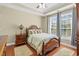 Cozy main bedroom with ceiling fan, wood floors, and ample natural light at 2213 Gazebo Ct., North Myrtle Beach, SC 29582
