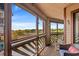 Relaxing screened balcony featuring comfortable seating and lovely views of the outdoors at 223 Maison Dr. # F-12, Myrtle Beach, SC 29572