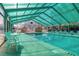 Bright, naturally lit indoor pool and deck area with multiple chairs and tables for residents and guests at 223 Maison Dr. # F-12, Myrtle Beach, SC 29572