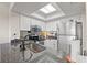 Well-lit kitchen with granite countertops, stainless steel appliances, and modern sink fixtures at 223 Maison Dr. # F-12, Myrtle Beach, SC 29572