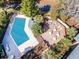 Overhead shot of a community pool area with a spacious deck and ample seating at 223 Maison Dr. # F-12, Myrtle Beach, SC 29572