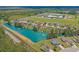 Scenic view overlooking a community pond with fountains and lush greenery surrounding the homes at 227 Hickory Springs Ct., Conway, SC 29527