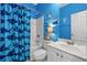 Bright bathroom with shower/tub combo, single sink vanity and fun decor at 227 Hickory Springs Ct., Conway, SC 29527