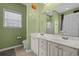 Bathroom featuring double sink vanity, tiled floors, and walk-in shower at 227 Hickory Springs Ct., Conway, SC 29527