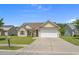 Charming one-story house featuring an attached garage, driveway, and well-kept lawn at 227 Hickory Springs Ct., Conway, SC 29527