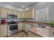 Functional kitchen with stainless steel appliances and lots of natural light at 227 Hickory Springs Ct., Conway, SC 29527