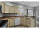 Bright and airy kitchen with modern appliances, ample counter space, and a sink with a view at 227 Hickory Springs Ct., Conway, SC 29527