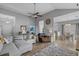 An open concept living room with a comfortable sofa, ceiling fan, and lots of light at 227 Hickory Springs Ct., Conway, SC 29527