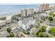 Aerial perspective showcasing the condo's proximity to the ocean, neighboring buildings, and beach access at 2406 S Ocean Blvd. # 301, North Myrtle Beach, SC 29582