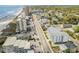 Stunning aerial perspective of the condo's location near the beach, buildings, and streets at 2406 S Ocean Blvd. # 301, North Myrtle Beach, SC 29582