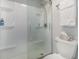 Clean bathroom with white shower stall and clear glass doors, plus toilet at 2406 S Ocean Blvd. # 301, North Myrtle Beach, SC 29582