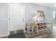 Charming entryway with a decorative storage unit, adding style and functionality at 2406 S Ocean Blvd. # 301, North Myrtle Beach, SC 29582