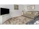 Comfortable living room with coastal decor, plush seating, and serene ambiance at 2406 S Ocean Blvd. # 301, North Myrtle Beach, SC 29582